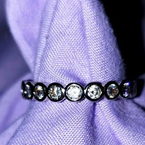 White Sapphire band in .925 Sterling Silver